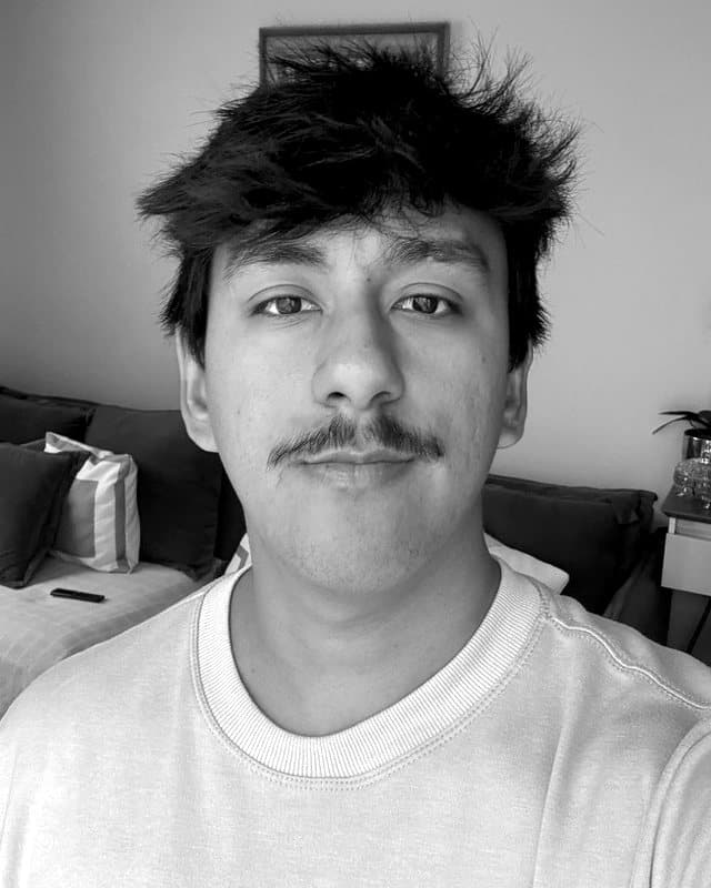 Black-and-white portrait of Thiago Penaloza